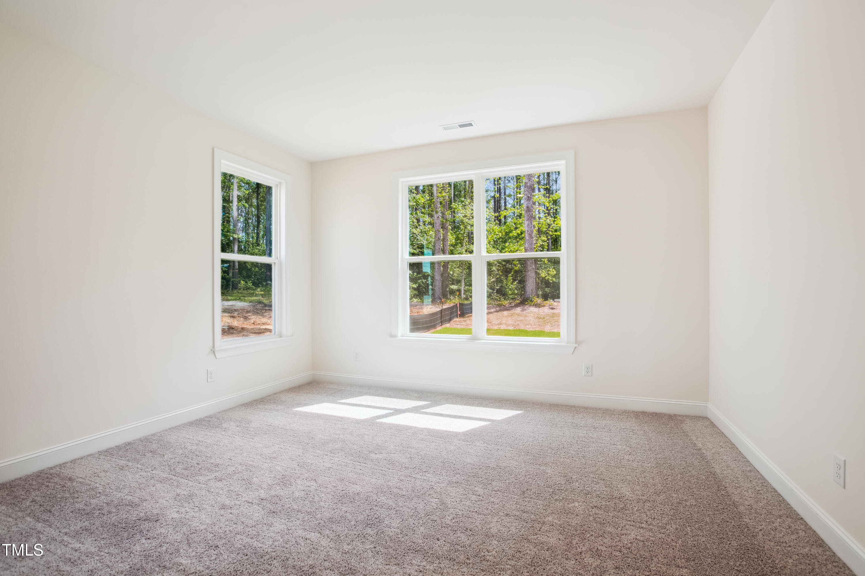 73 Artic Circle Garner, NC 27529 - Photo 15 of 39 an empty room with windows