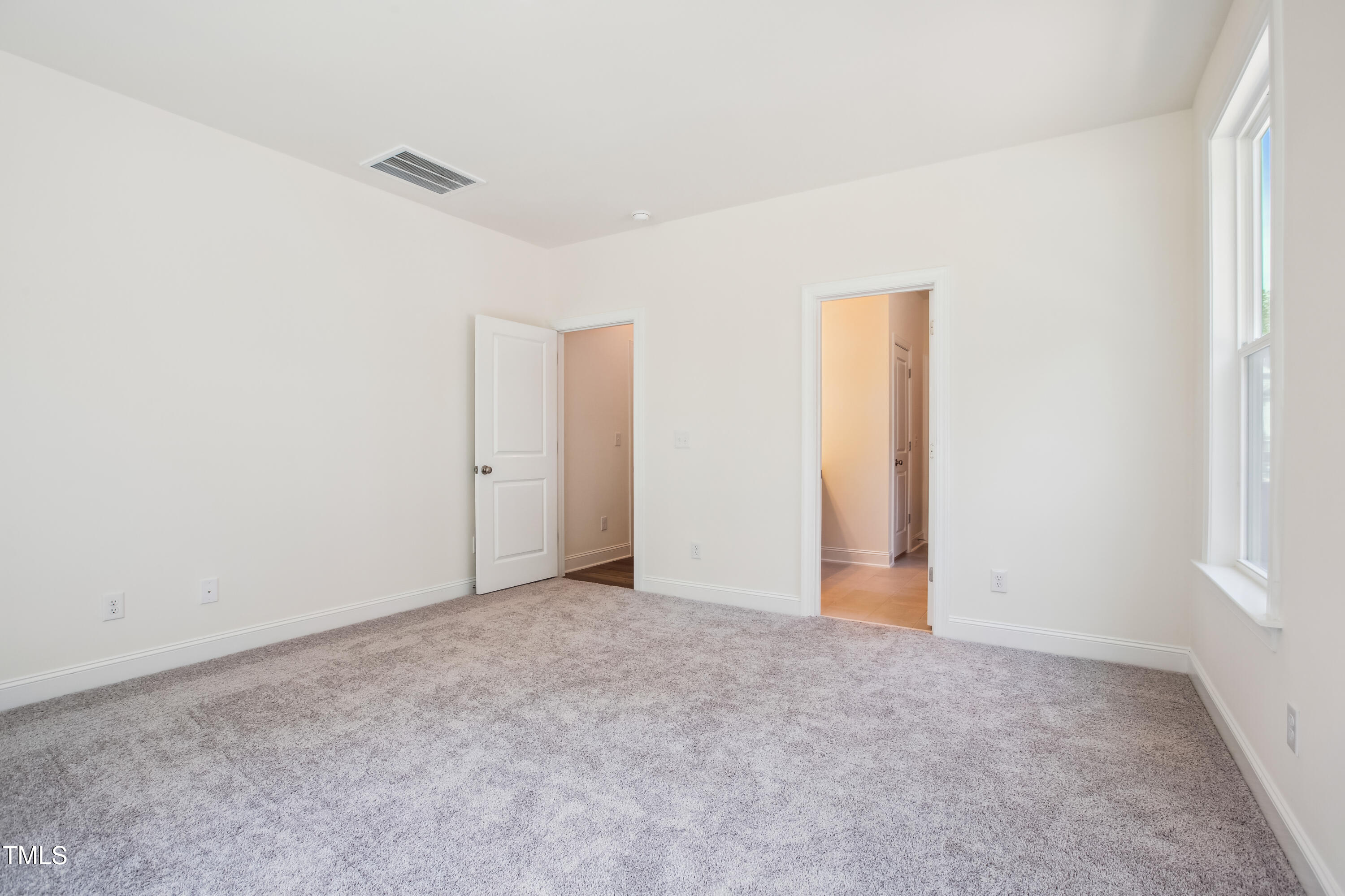 73 Artic Circle Garner, NC 27529 - Photo 16 of 39 an empty room with an entryway