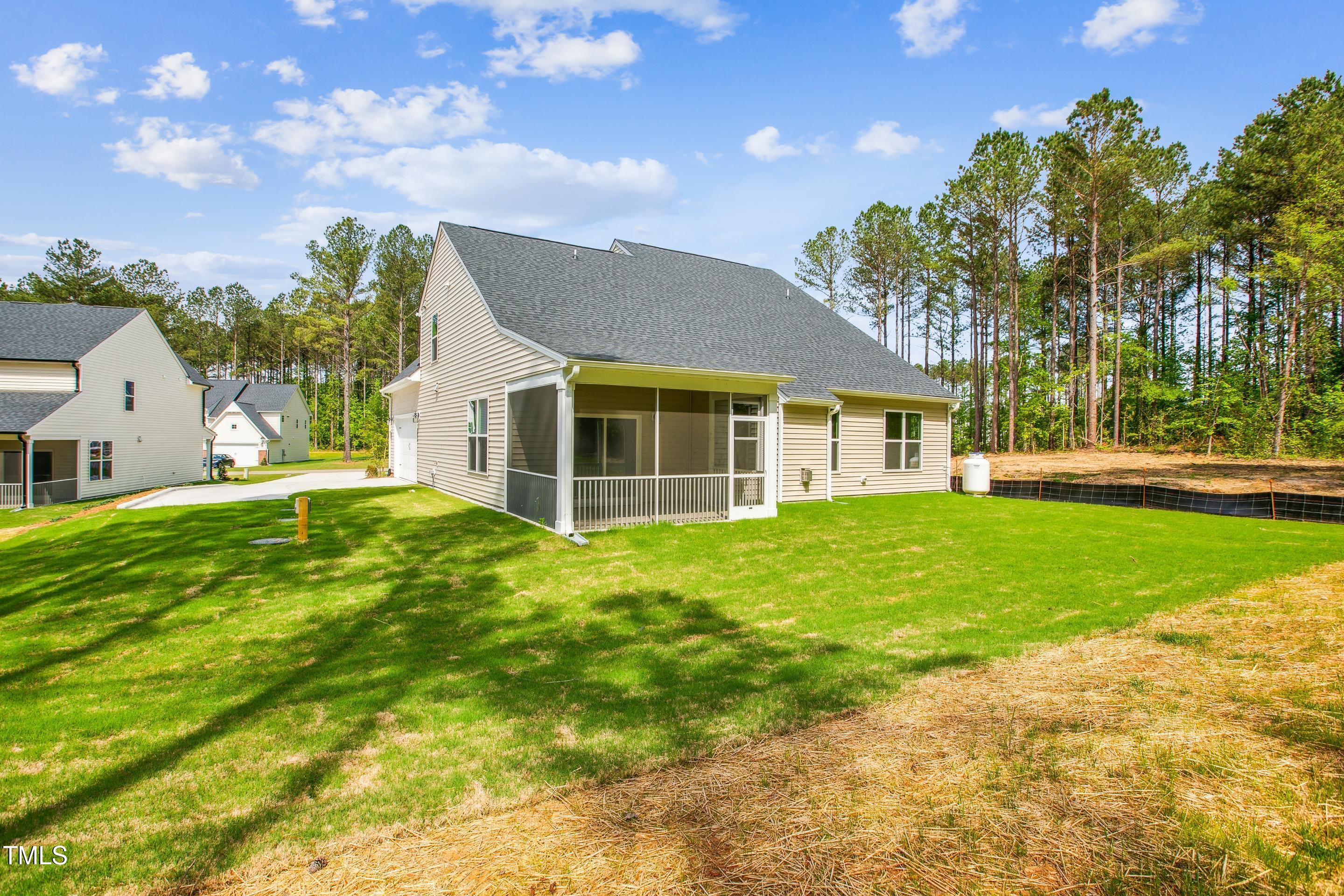 73 Artic Circle Garner, NC 27529 - Photo 3 of 39 a view of a house with a backyard