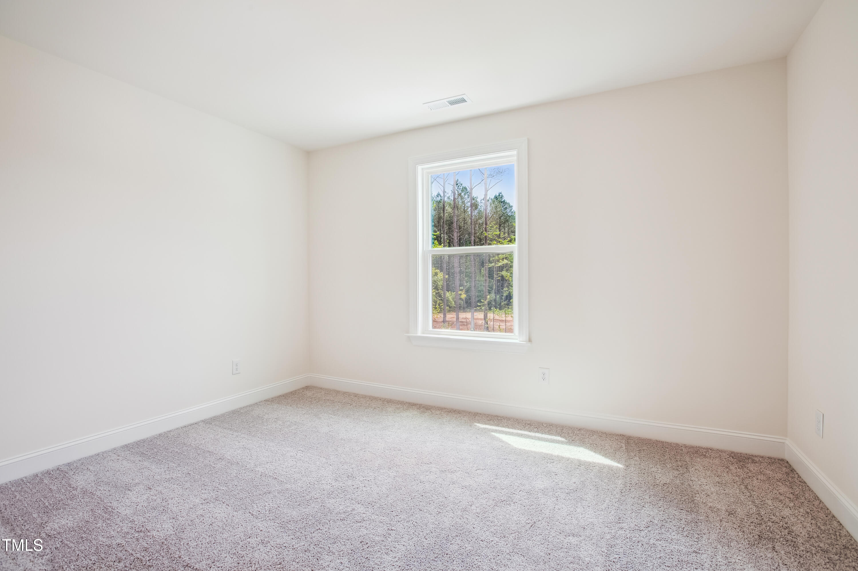 73 Artic Circle Garner, NC 27529 - Photo 35 of 39 an empty room with windows