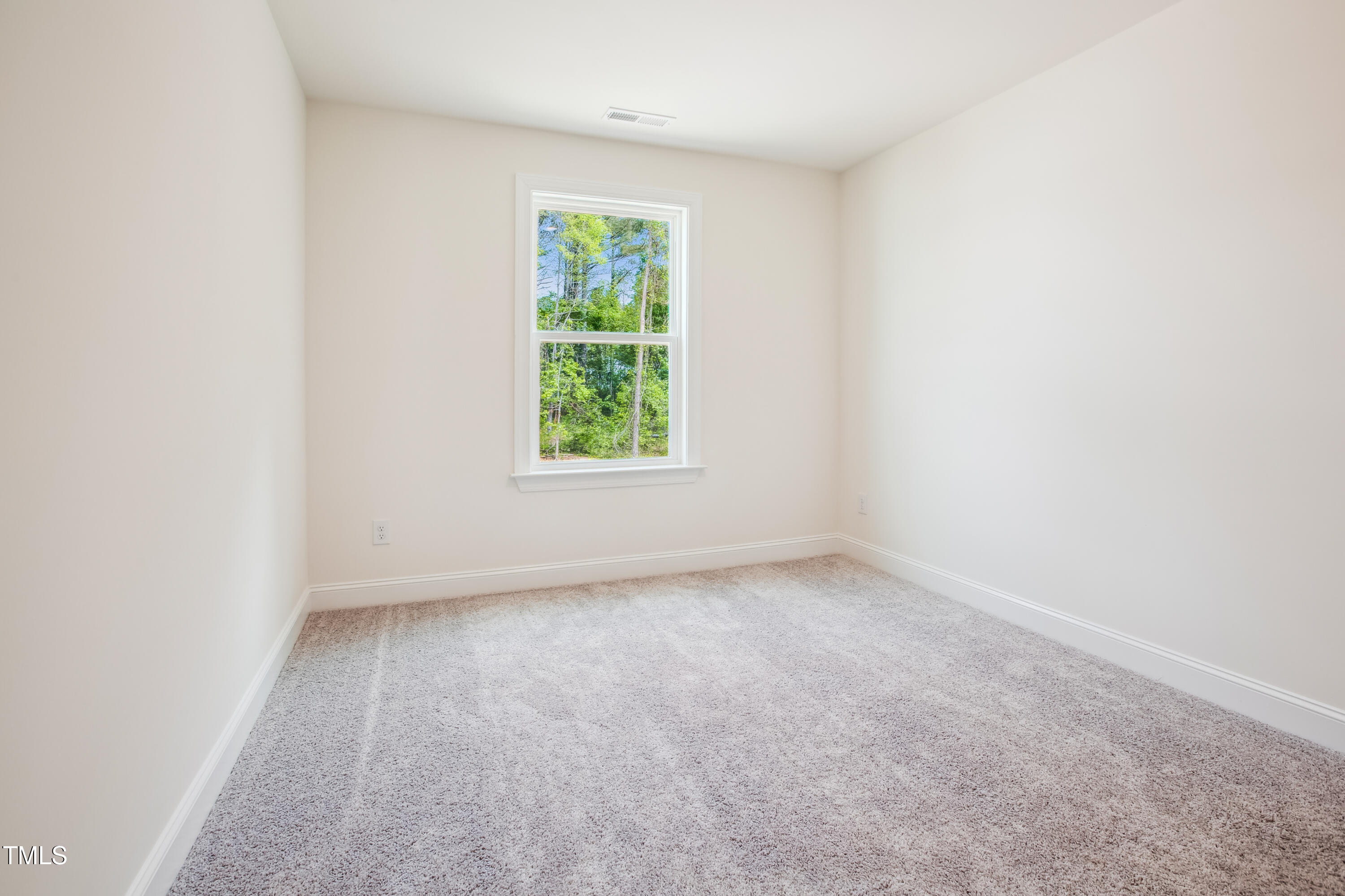 73 Artic Circle Garner, NC 27529 - Photo 37 of 39 an empty room with a window