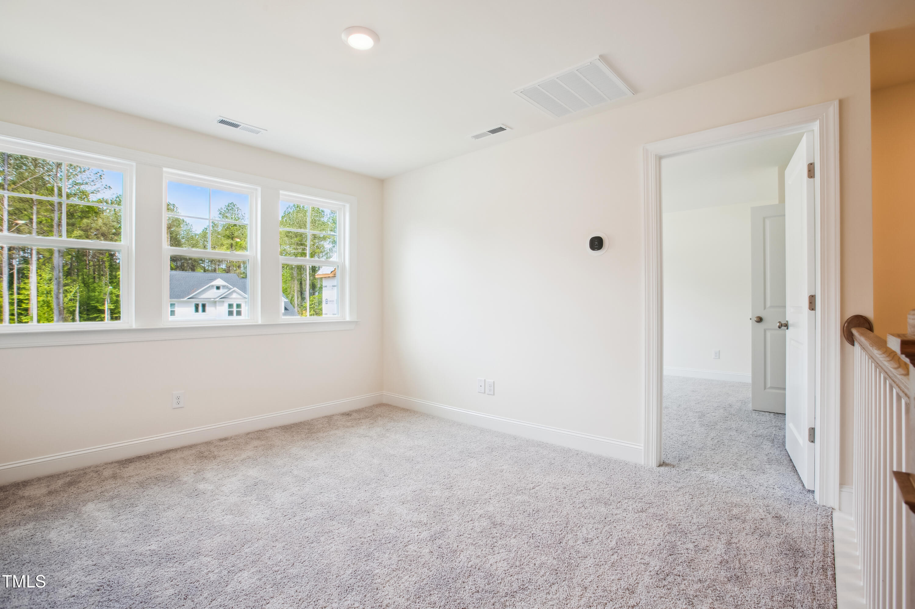 73 Artic Circle Garner, NC 27529 - Photo 39 of 39 a view of an empty room with a window