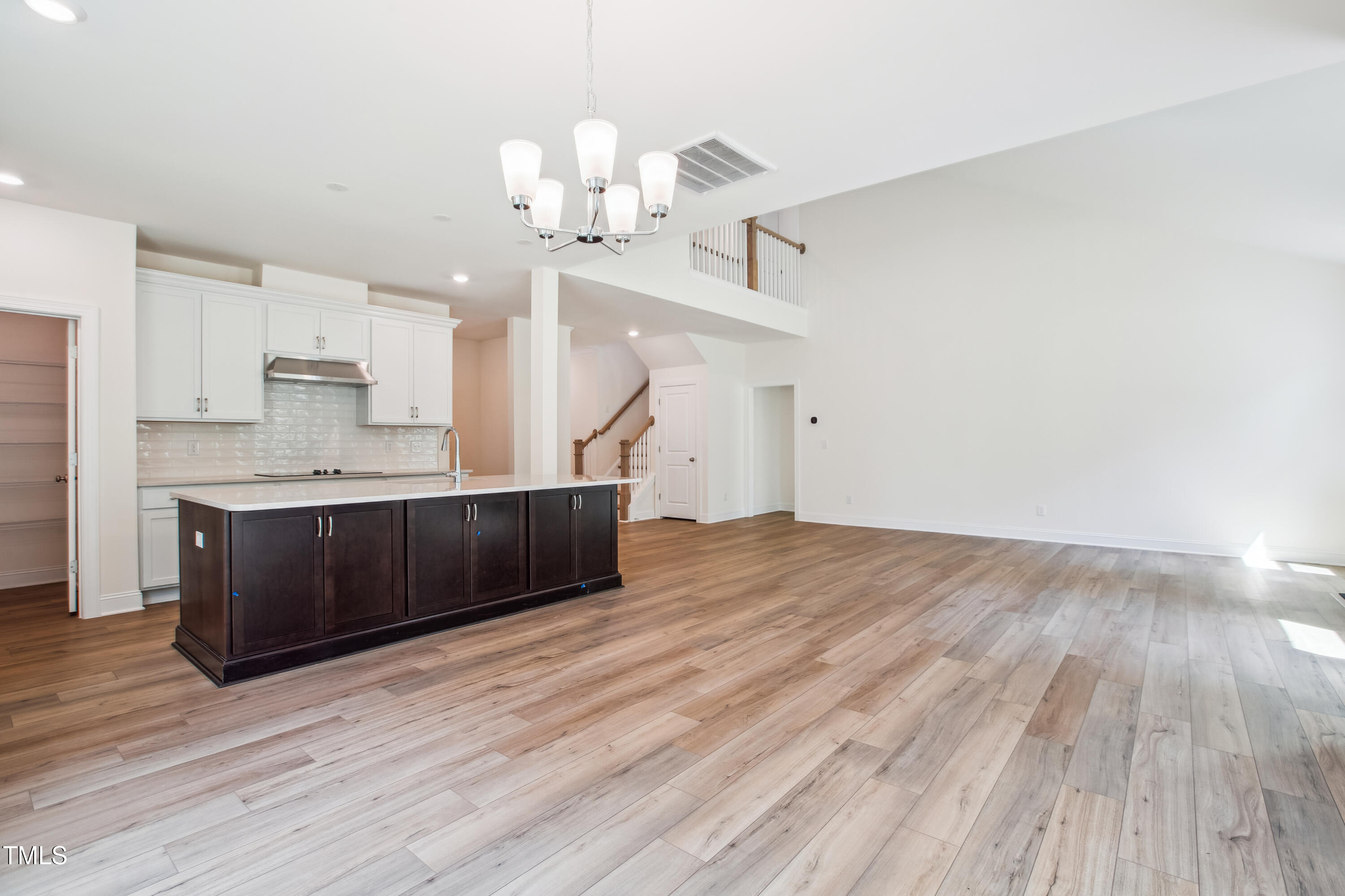 73 Artic Circle Garner, NC 27529 - Photo 5 of 39 a kitchen with a sink cabinets and wooden floor