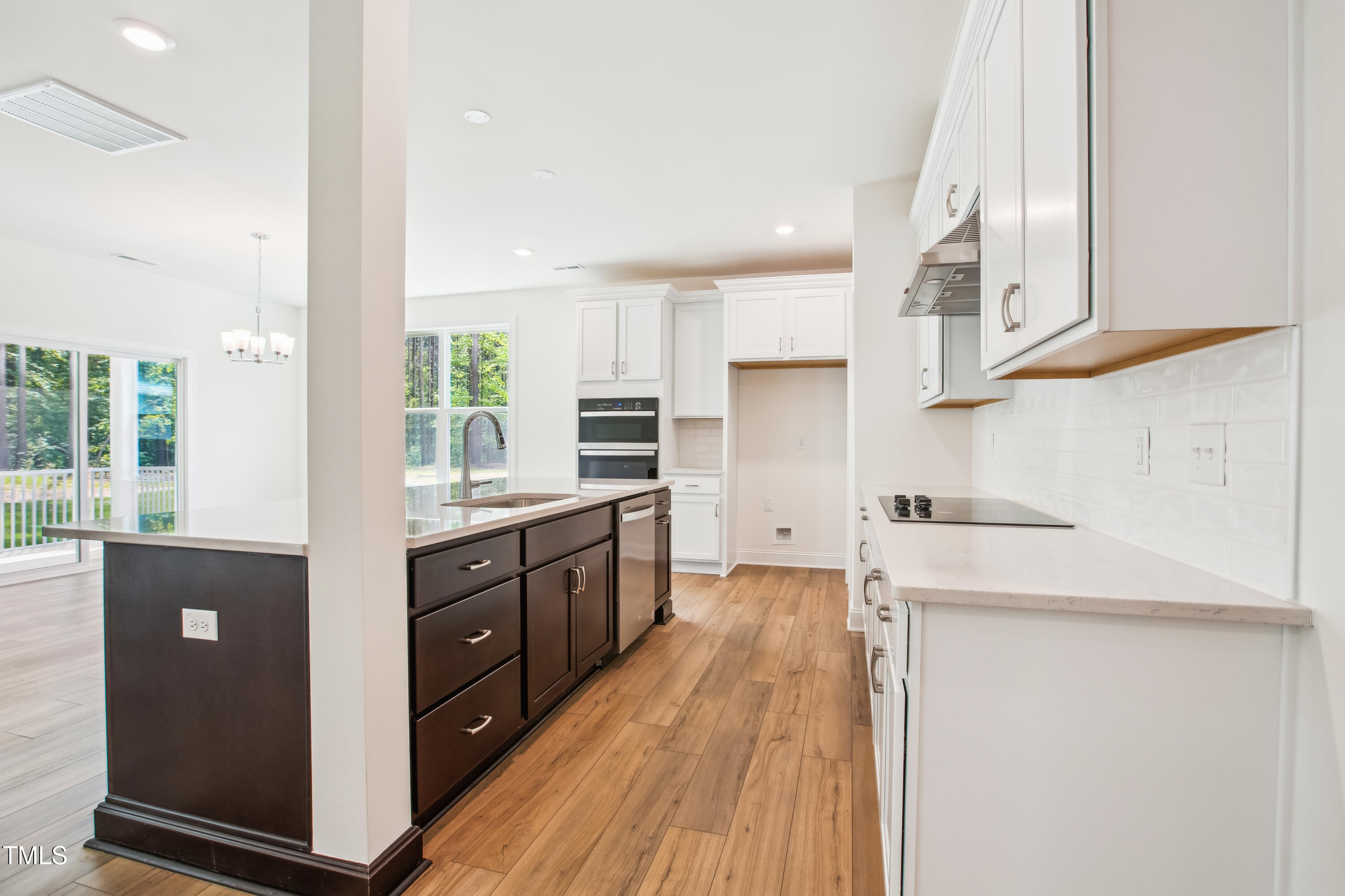 73 Artic Circle Garner, NC 27529 - Photo 7 of 39 a kitchen with stainless steel appliances a refrigerator and a stove