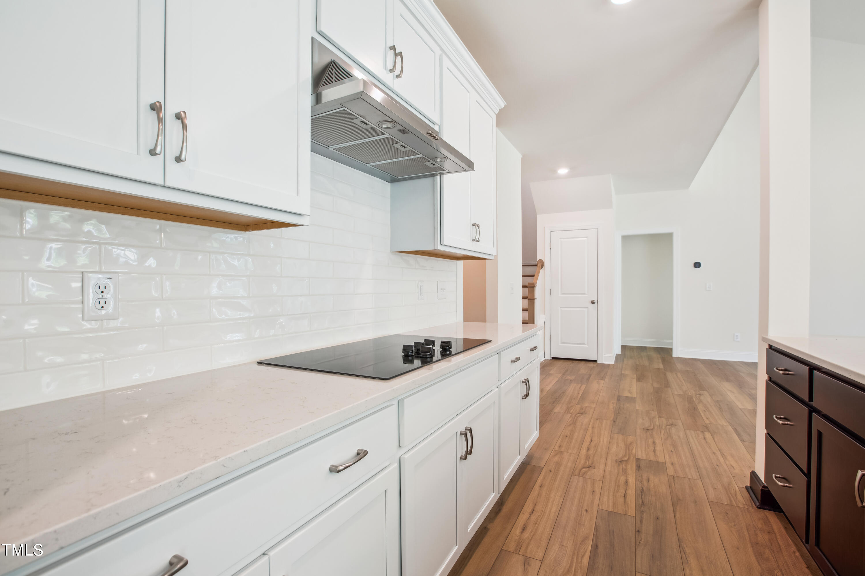 73 Artic Circle Garner, NC 27529 - Photo 10 of 39 a kitchen with cabinets and wooden floor