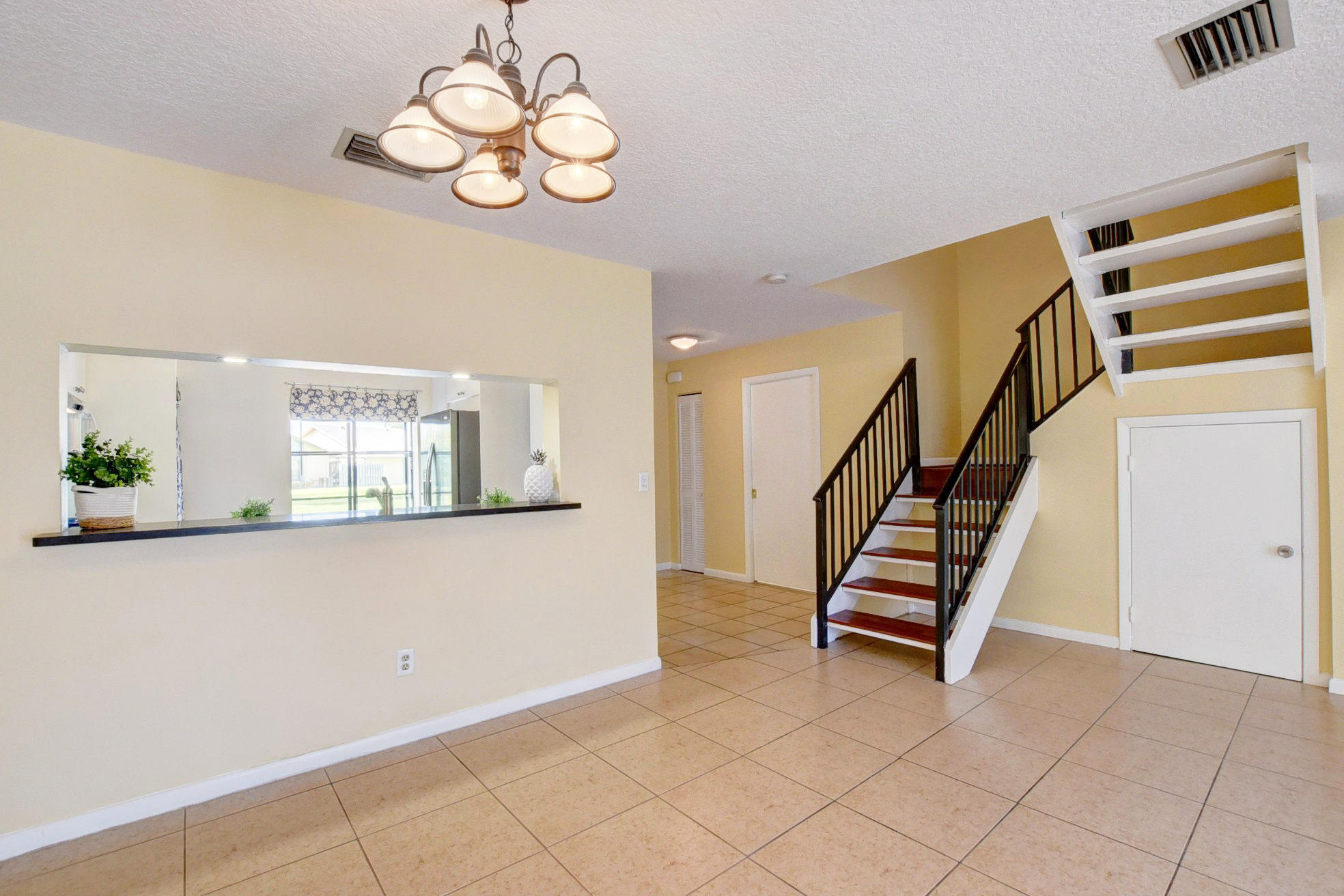 9166 Southwest 21st Court, Unit D Boca Raton, FL 33428 - Photo 13 of 48 Under the stairs Harry Potter closet