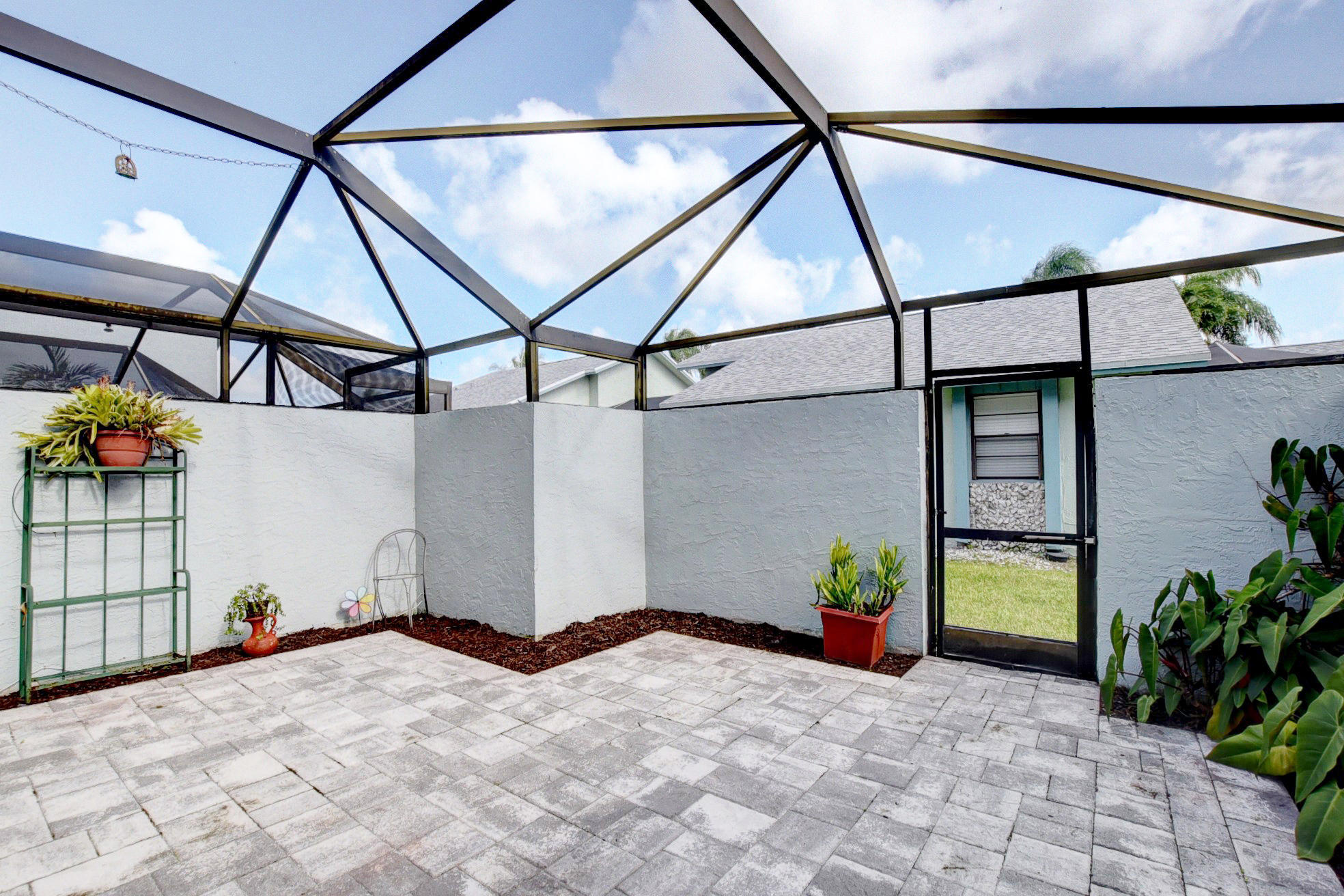 9166 Southwest 21st Court, Unit D Boca Raton, FL 33428 - Photo 35 of 48 Enclosed Porch