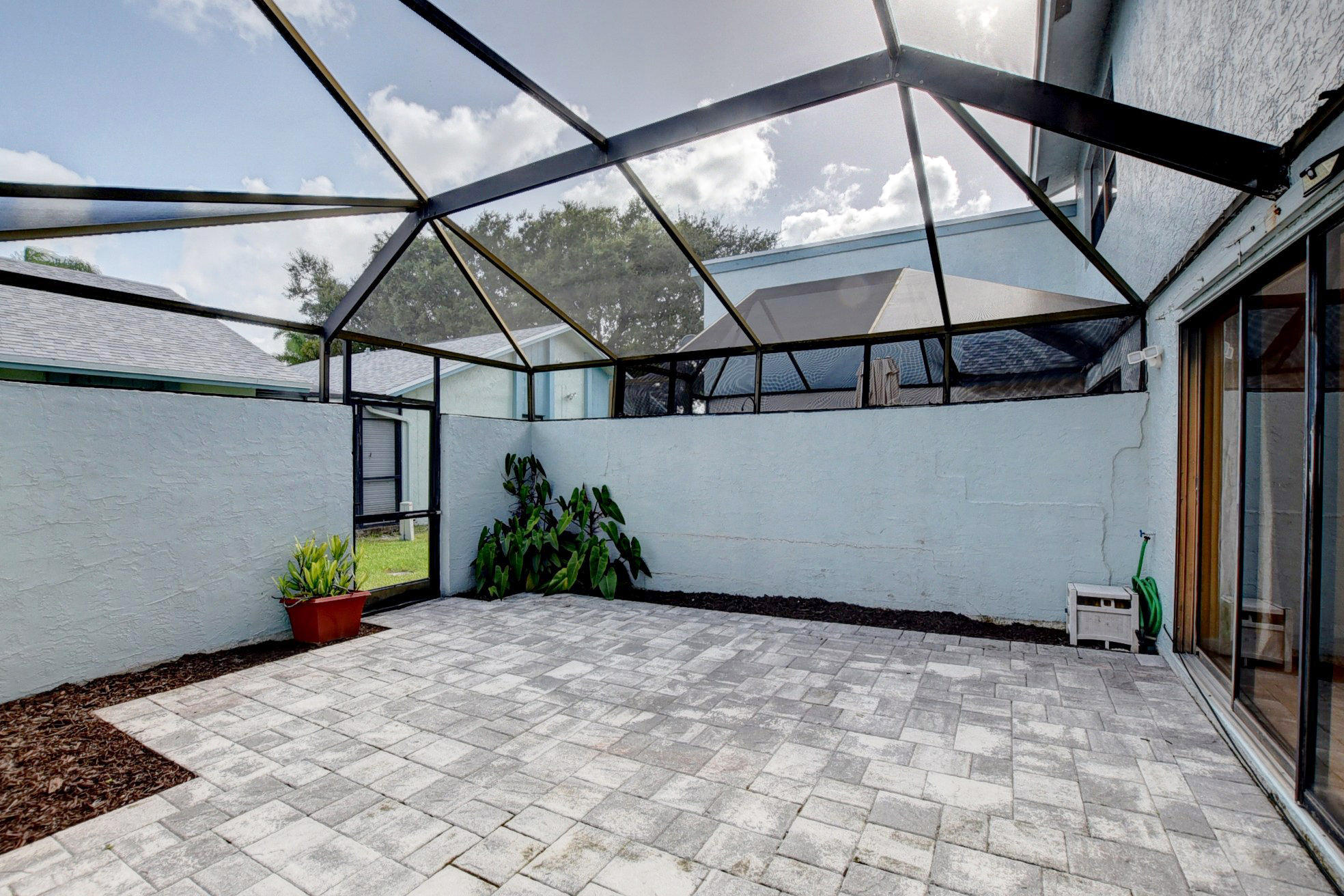 9166 Southwest 21st Court, Unit D Boca Raton, FL 33428 - Photo 36 of 48 Enclosed Porch