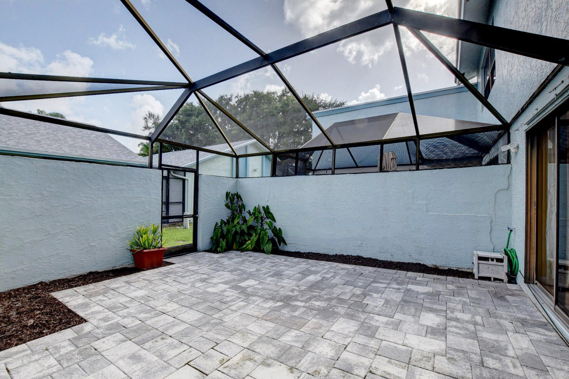 9166 Southwest 21st Court, Unit D Boca Raton, FL 33428 - Photo 38 of 48 Screened in throughout