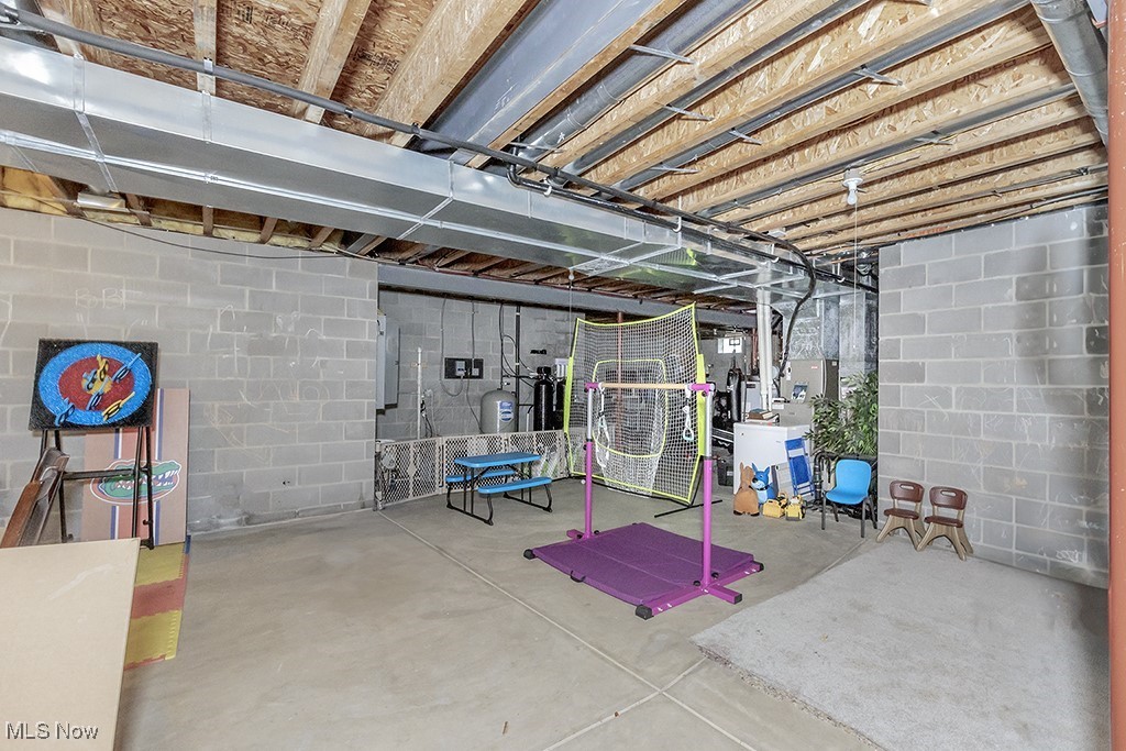 11651 Colburn Road Painesville, OH 44077 - Photo 36 of 42 Sprawling basement - high ceilings just waiting for your finishing touches