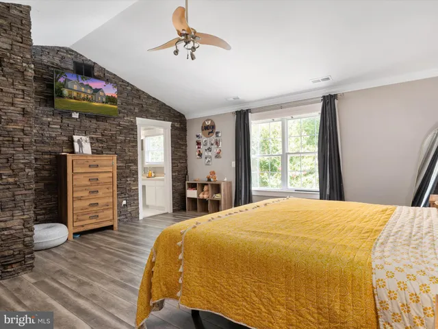 a bathroom with a sink double vanity and a mirror