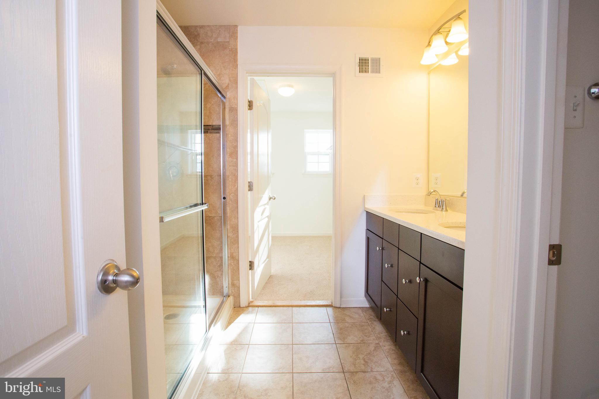 10523 Braddock Run Road Baltimore, MD 21220 - Photo 20 of 40 Walk-in closet off of the master bathroom