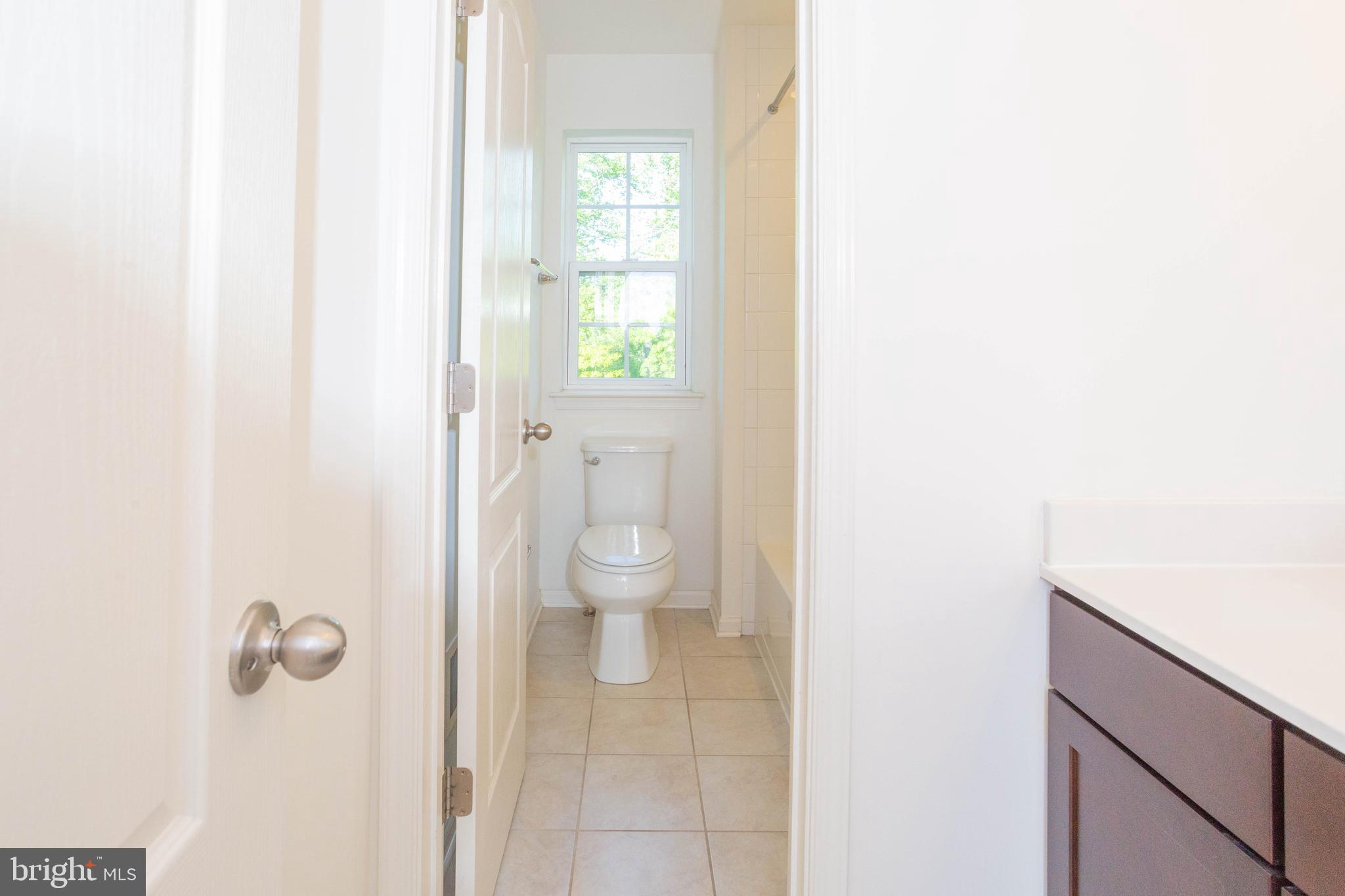 10523 Braddock Run Road Baltimore, MD 21220 - Photo 27 of 40 Shared upstair bathroom with separate toilet area.