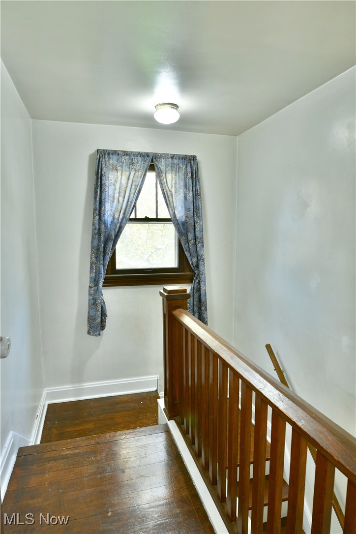 572 Howland Wilson Road Southeast Warren, OH 44484 - Photo 32 of 50 Staircase with hardwood / wood-style flooring
