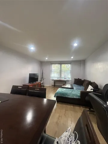 a view of swimming pool with outdoor seating and yard