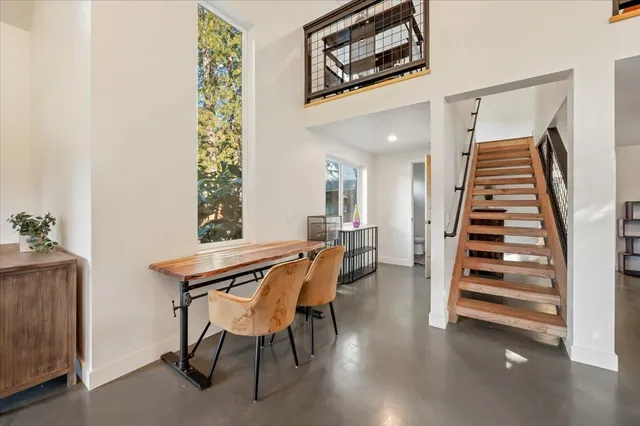 a bathroom with a sink toilet and mirror
