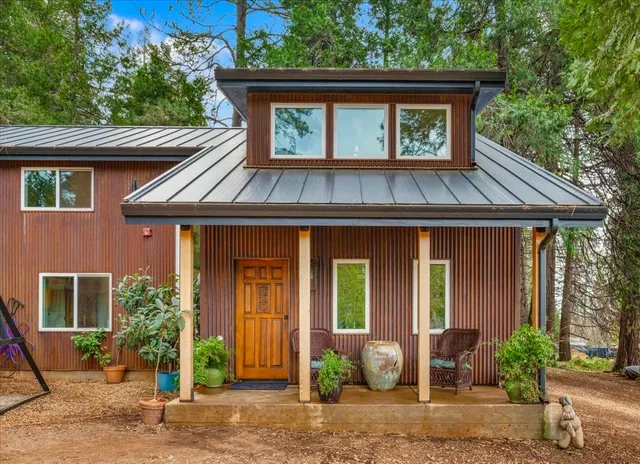 a backyard of a house with lots of green space