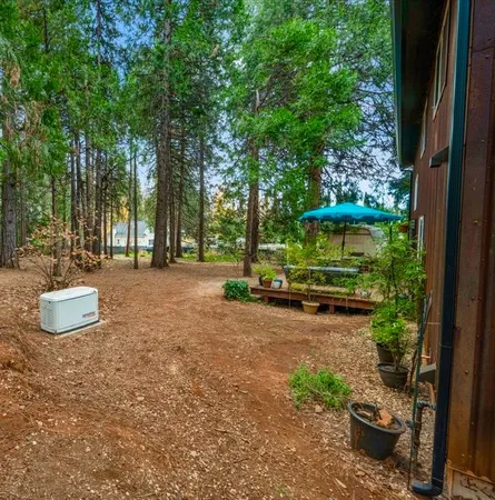 front view of a house with a garden