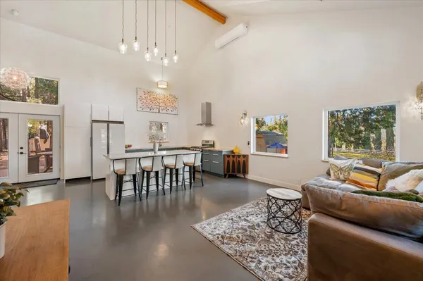 a living room with furniture and a couch