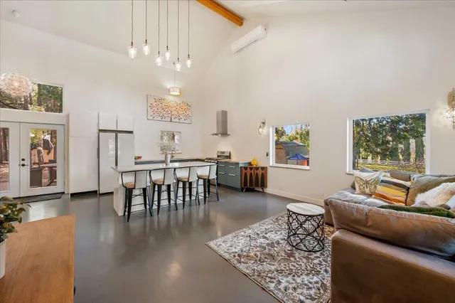 a living room with furniture and a couch