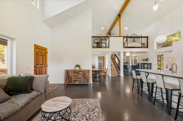 a dining room with furniture and window