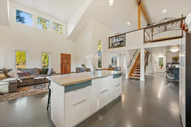a kitchen with stainless steel appliances a refrigerator and a sink