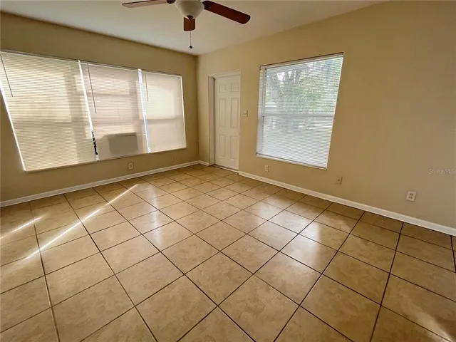 a view of an empty room and window