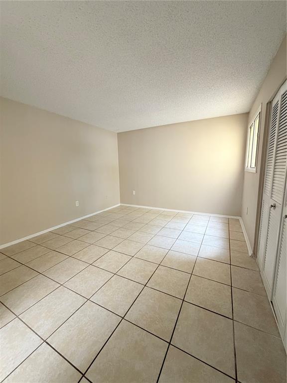 908 Lake Destiny Road, Unit B Altamonte Springs, FL 32714 - Photo 9 of 16 a view of an empty room and a window