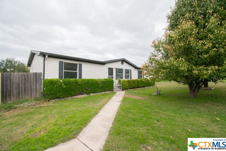 105 Grace Belton, TX 76513 - Photo 1 of 1 a view of a house with a yard and sitting area
