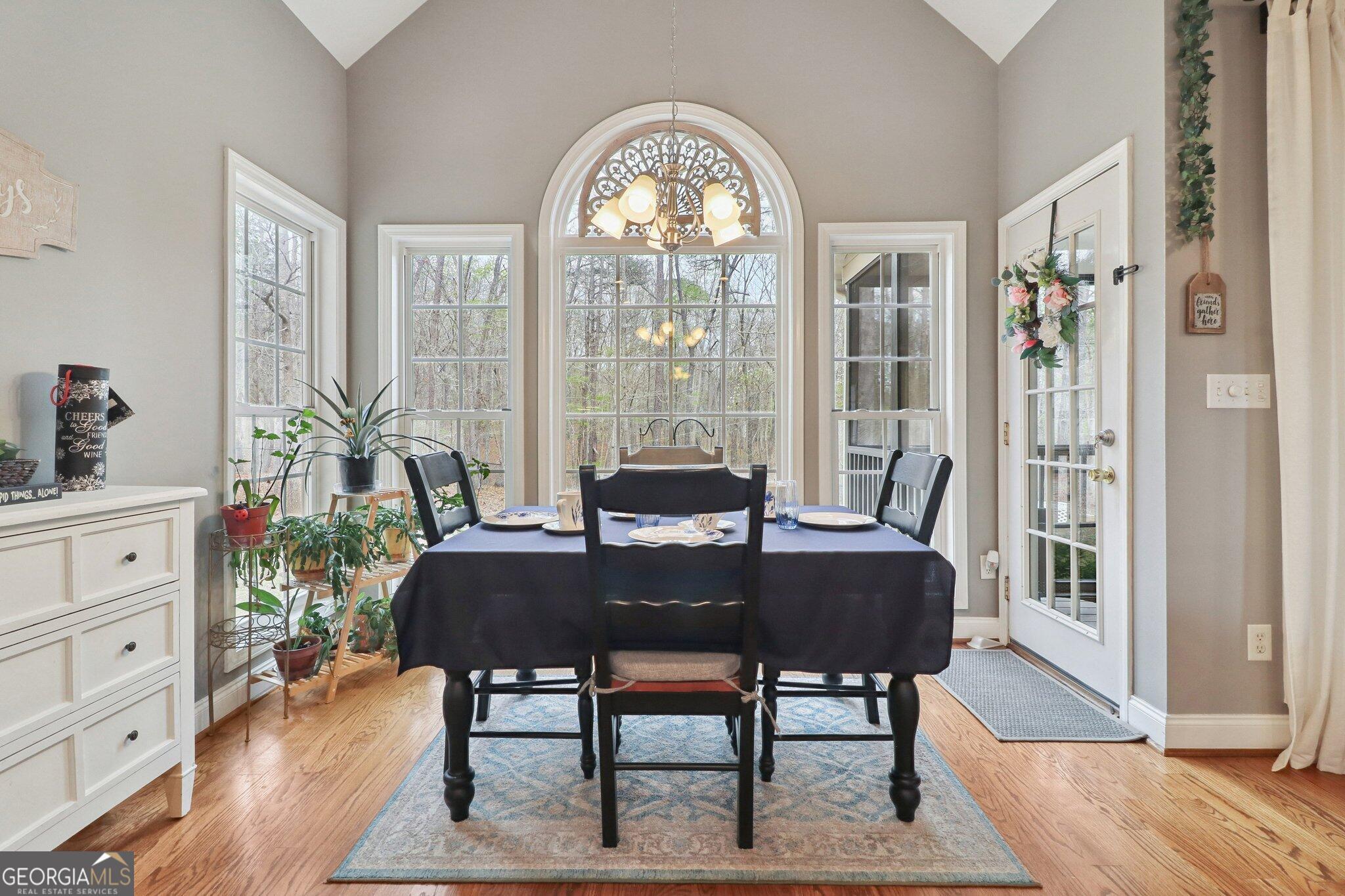 3792 Falls Trail Winston, GA 30187 - Photo 12 of 24 a view of a dining room with furniture window and wooden floor
