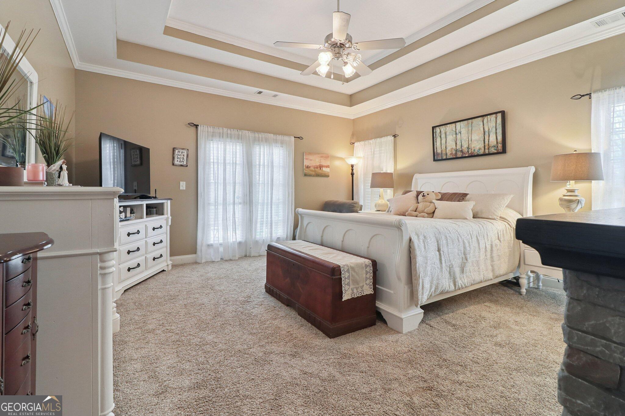 3792 Falls Trail Winston, GA 30187 - Photo 20 of 24 a spacious bedroom with a bed and a furniture