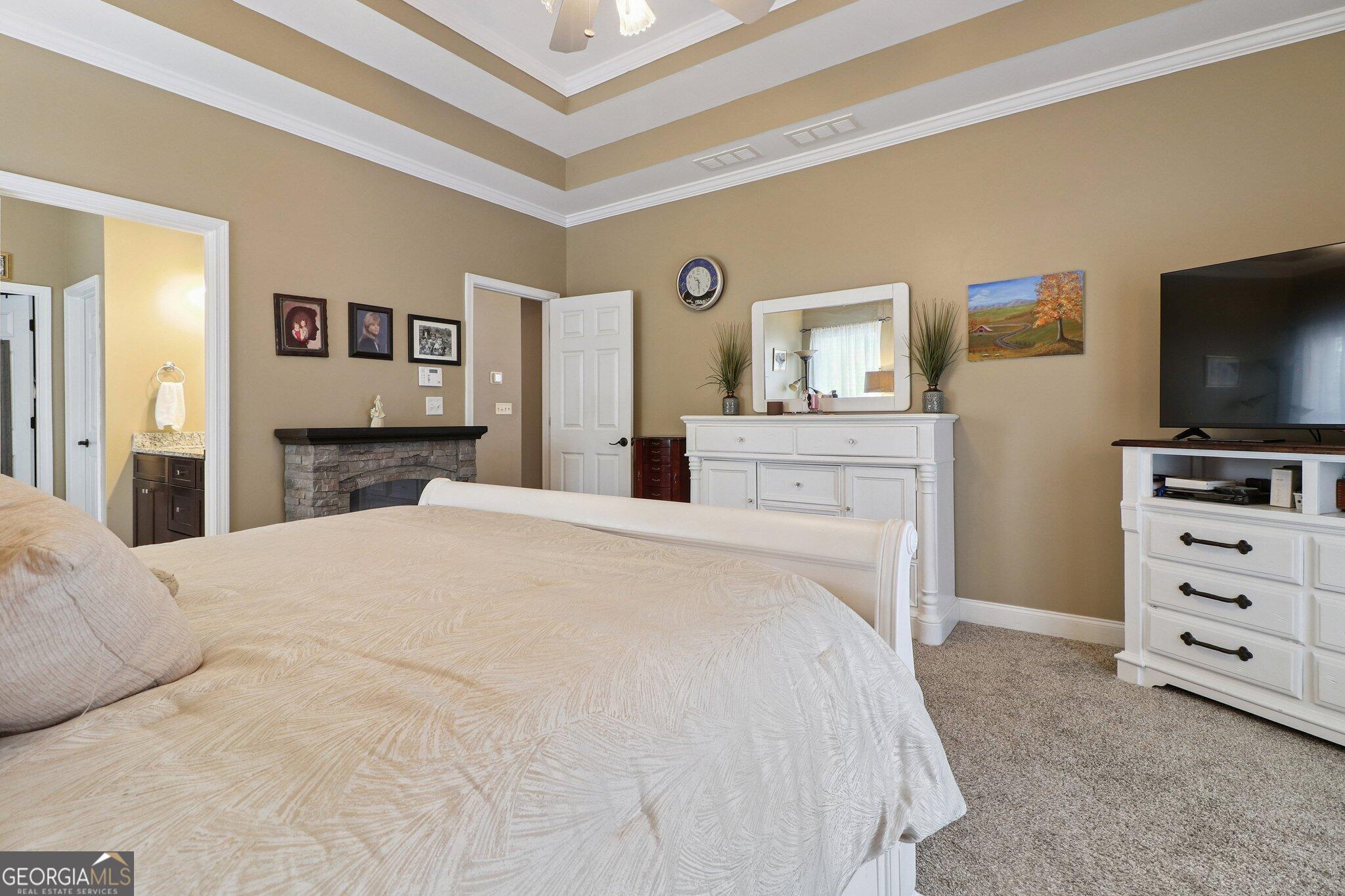 3792 Falls Trail Winston, GA 30187 - Photo 21 of 24 a bedroom with a bed and a flat screen tv in it