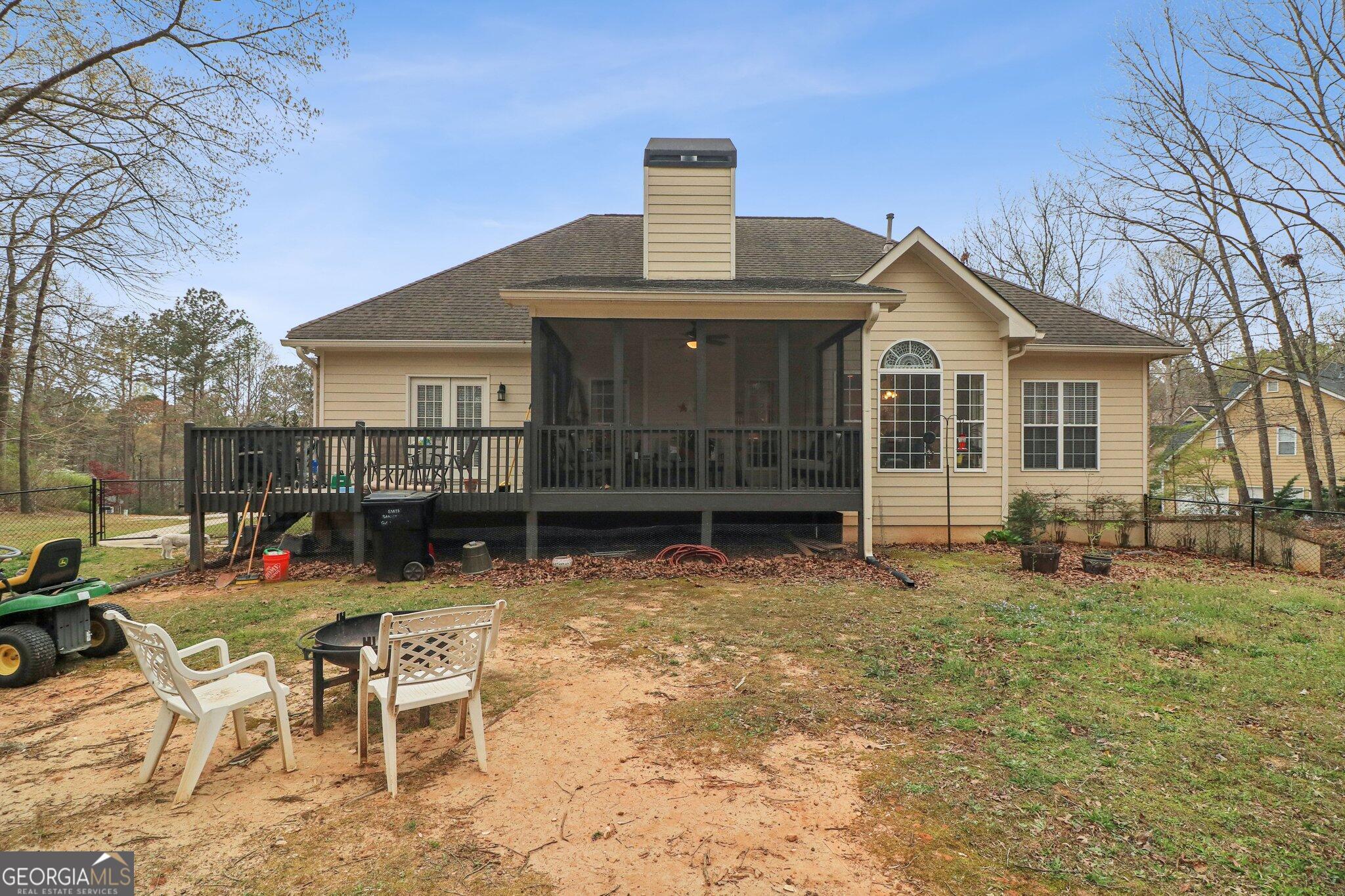 3792 Falls Trail Winston, GA 30187 - Photo 5 of 24 a front view of a house with garden
