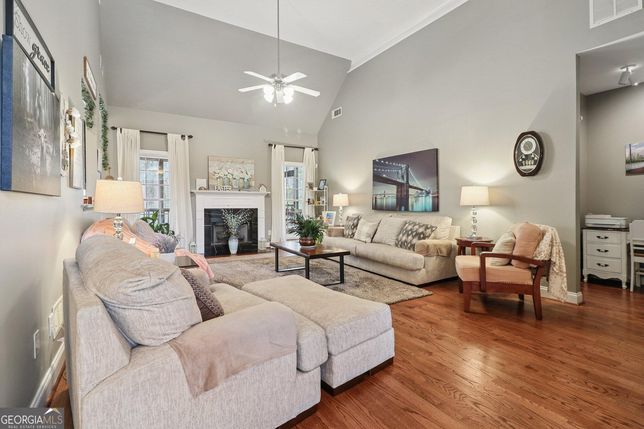 3792 Falls Trail Winston, GA 30187 - Photo 7 of 24 a living room with furniture fireplace and wooden floor