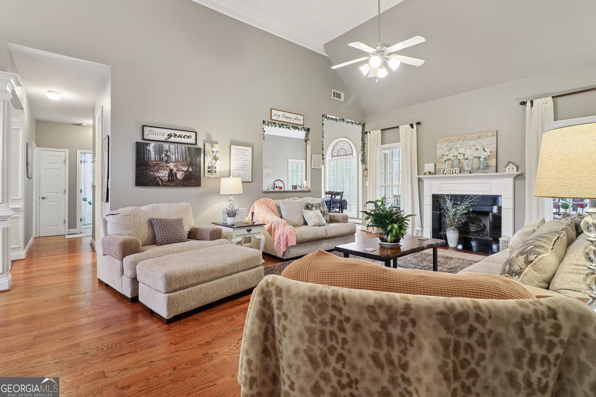 3792 Falls Trail Winston, GA 30187 - Photo 8 of 24 a living room with furniture and a fireplace