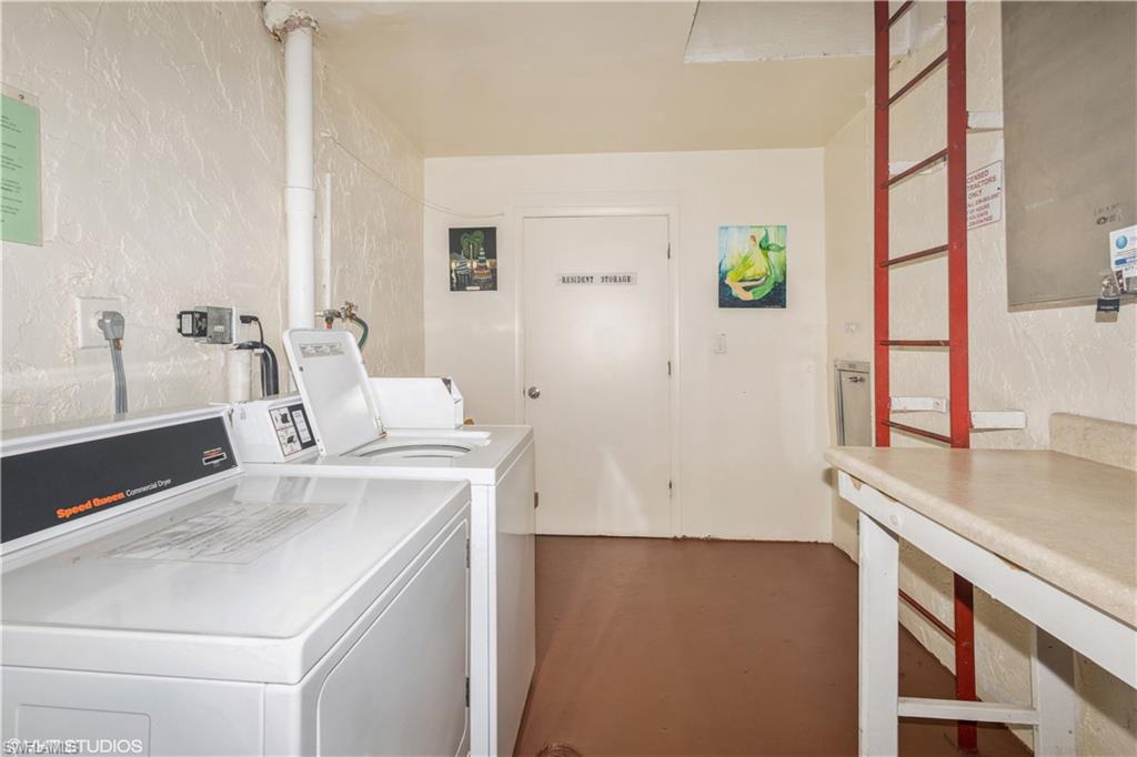190 Turtle Lake Court, Unit 311 Naples, FL 34105 - Photo 36 of 47 a room with a sink and a stove top oven