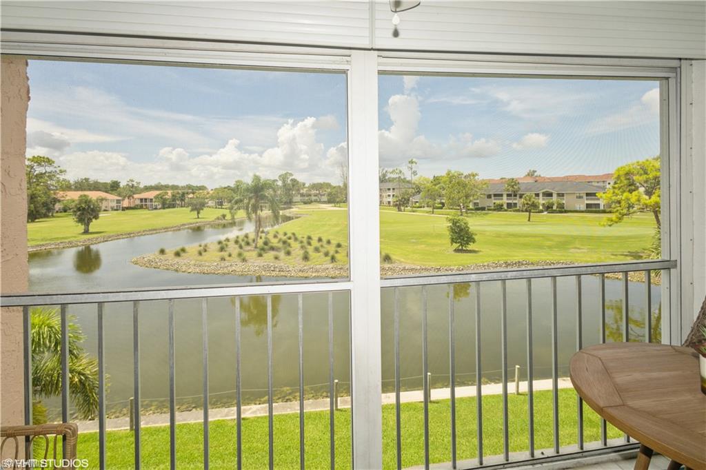 190 Turtle Lake Court, Unit 311 Naples, FL 34105 - Photo 6 of 47 a view of a balcony with lake view and a ocean view