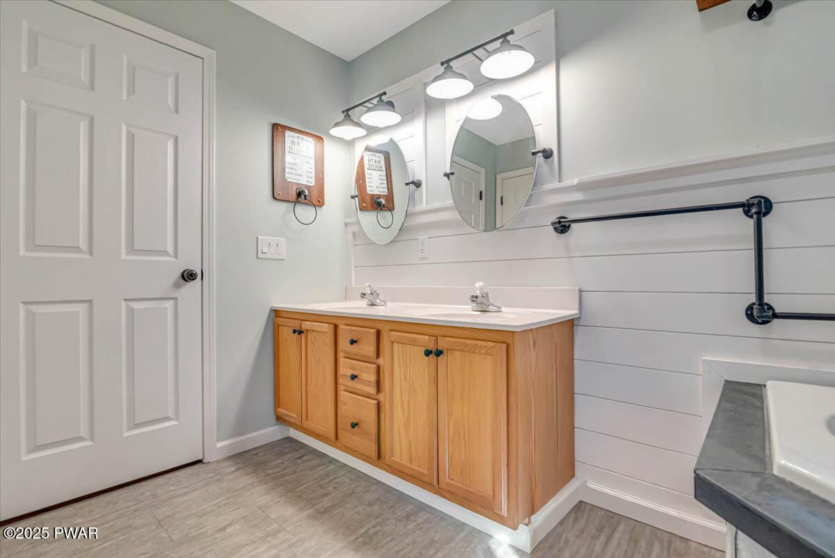 42 Beaver Pond Road Lake Ariel, PA 18436 - Photo 24 of 77 a spacious bathroom with a double vanity sink a mirror and shower