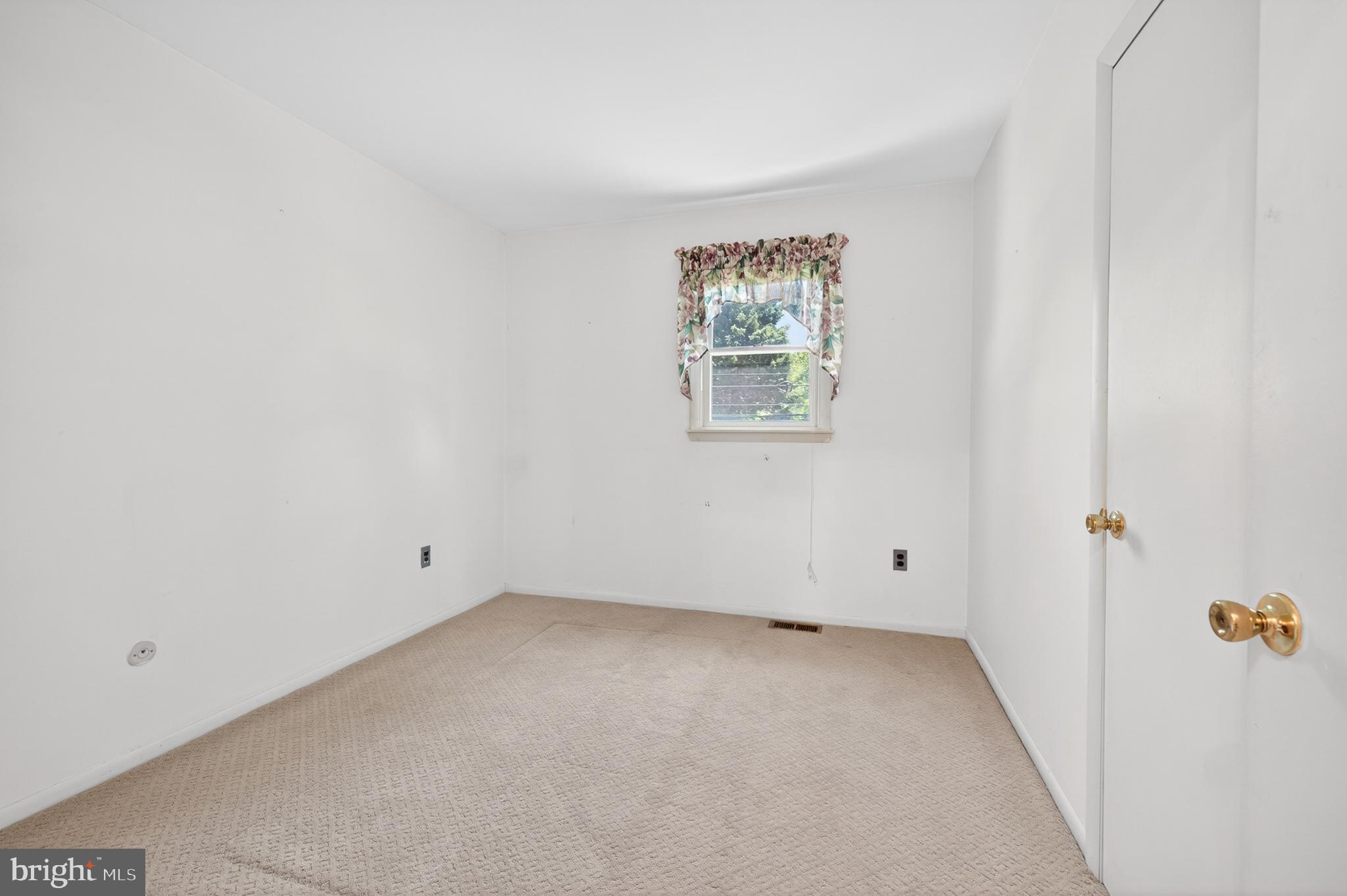 3701 Ebright Road Chadds Ford, PA 19317 - Photo 26 of 45 an empty room with windows