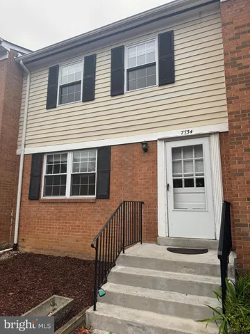 a front view of a house with a window