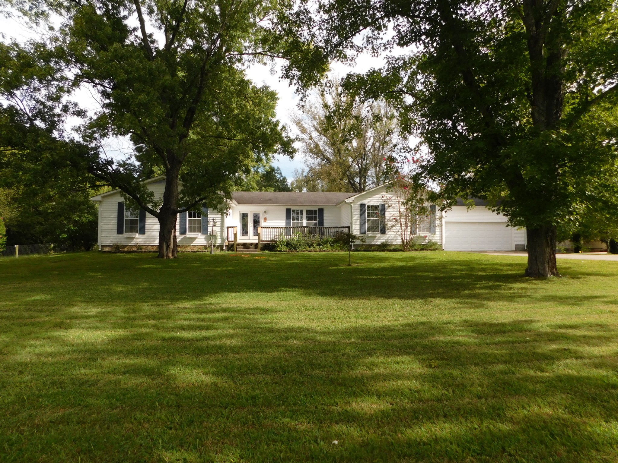696 Baker Road Columbia, TN 38401 - Photo 1 of 19 a front view of a house with a big yard