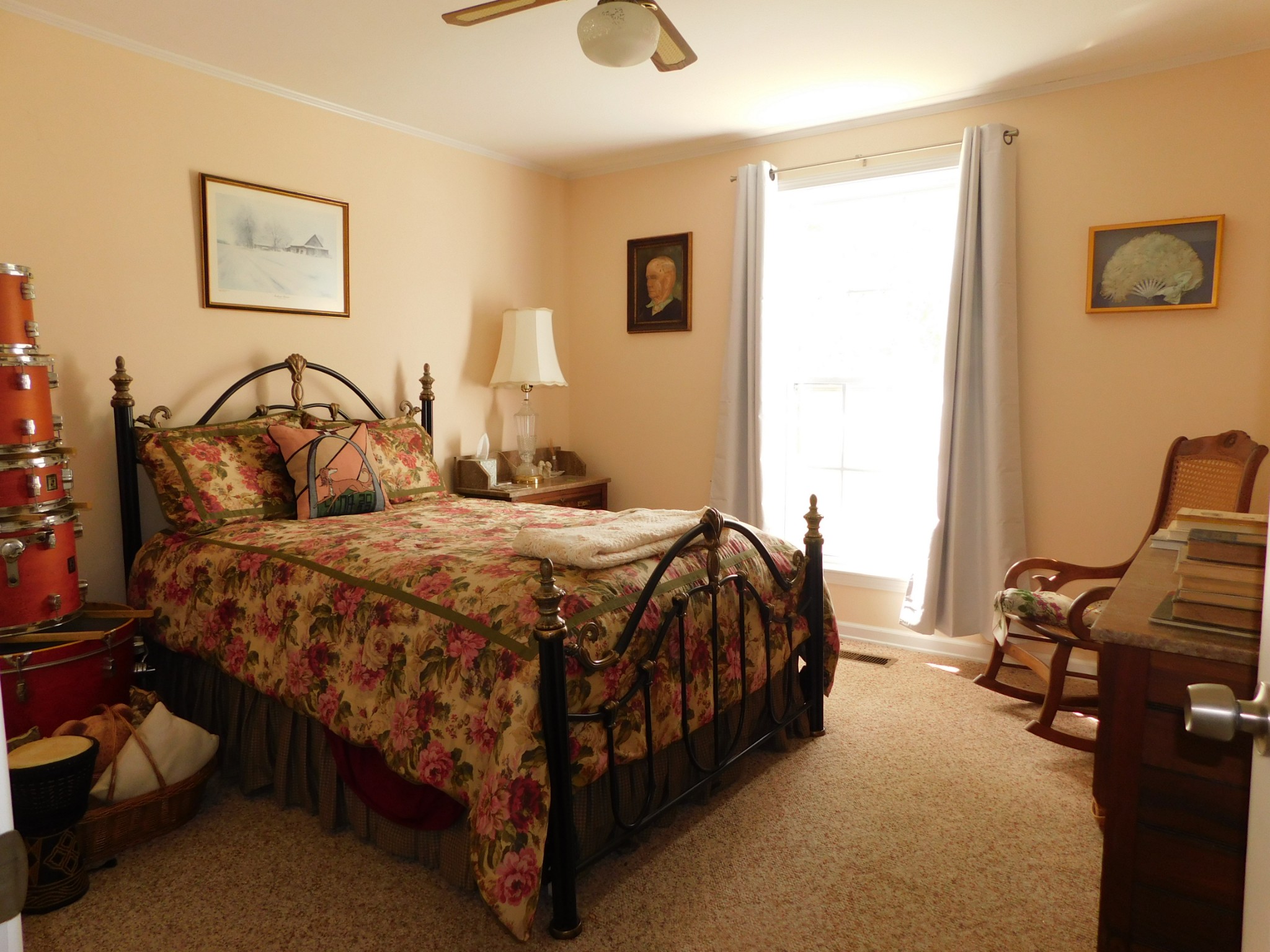 696 Baker Road Columbia, TN 38401 - Photo 11 of 19 a bed sitting in a bedroom next to a window