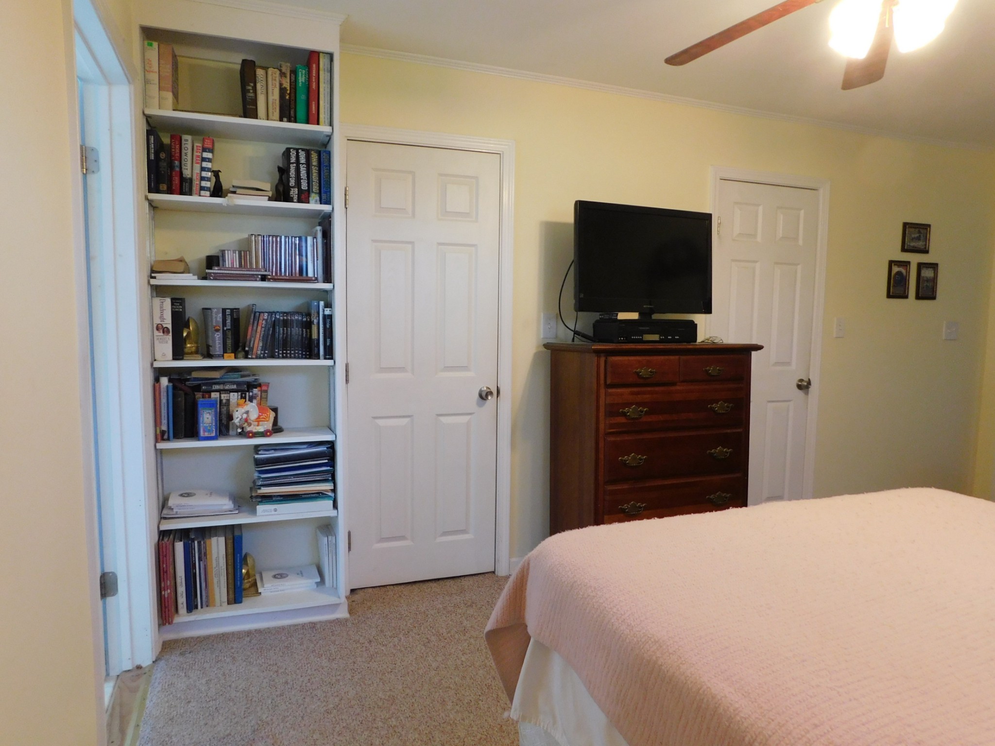 696 Baker Road Columbia, TN 38401 - Photo 9 of 19 a bedroom with a bed and a flat screen tv