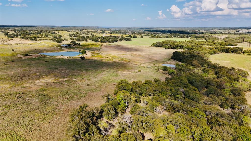 2101 Erwin Road Jacksboro, TX 76458 - Photo 5 of 26 Aerial view of sparsely populated area featuring a large body of water