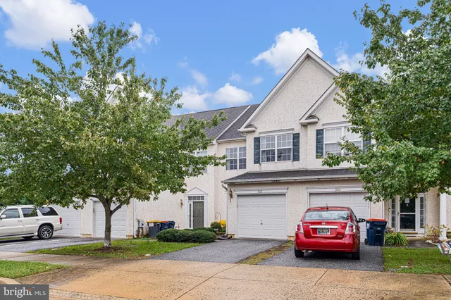 a car parked in front of a house