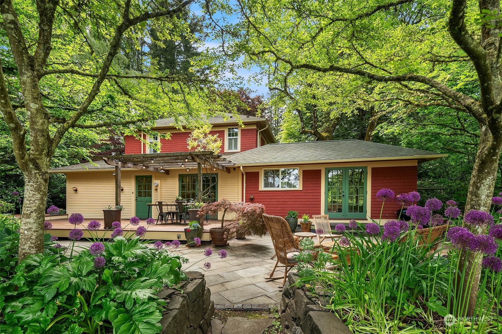 a front view of a house with garden