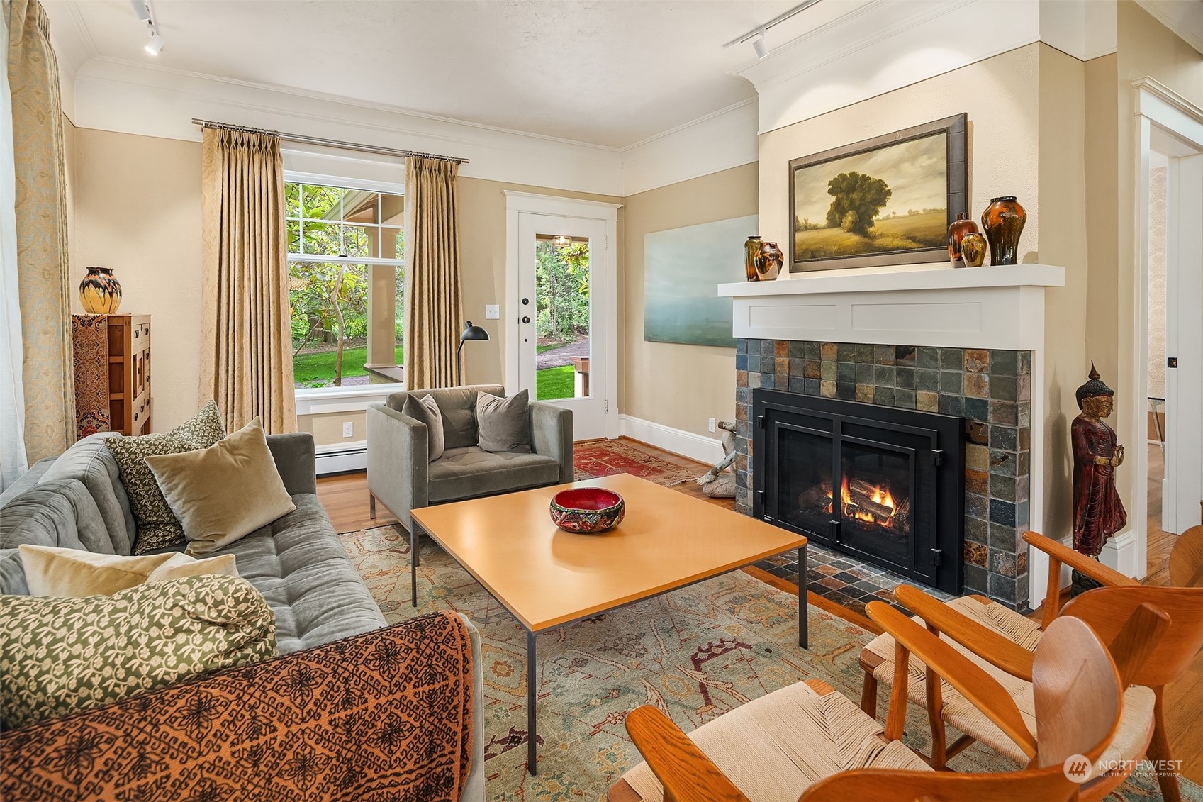 10810 Southwest Bank Road Vashon, WA 98070 - Photo 11 of 34 a living room with furniture and a fireplace
