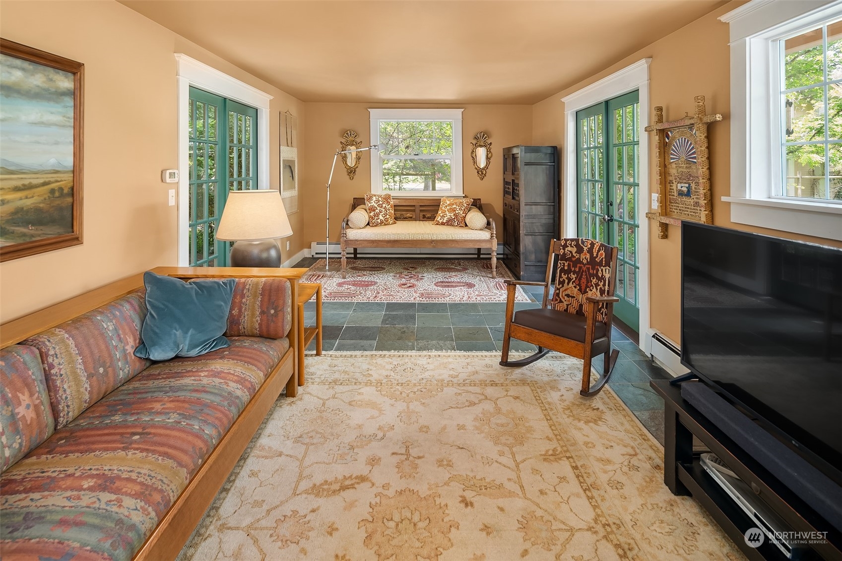 10810 Southwest Bank Road Vashon, WA 98070 - Photo 13 of 34 a living room with furniture and a fireplace