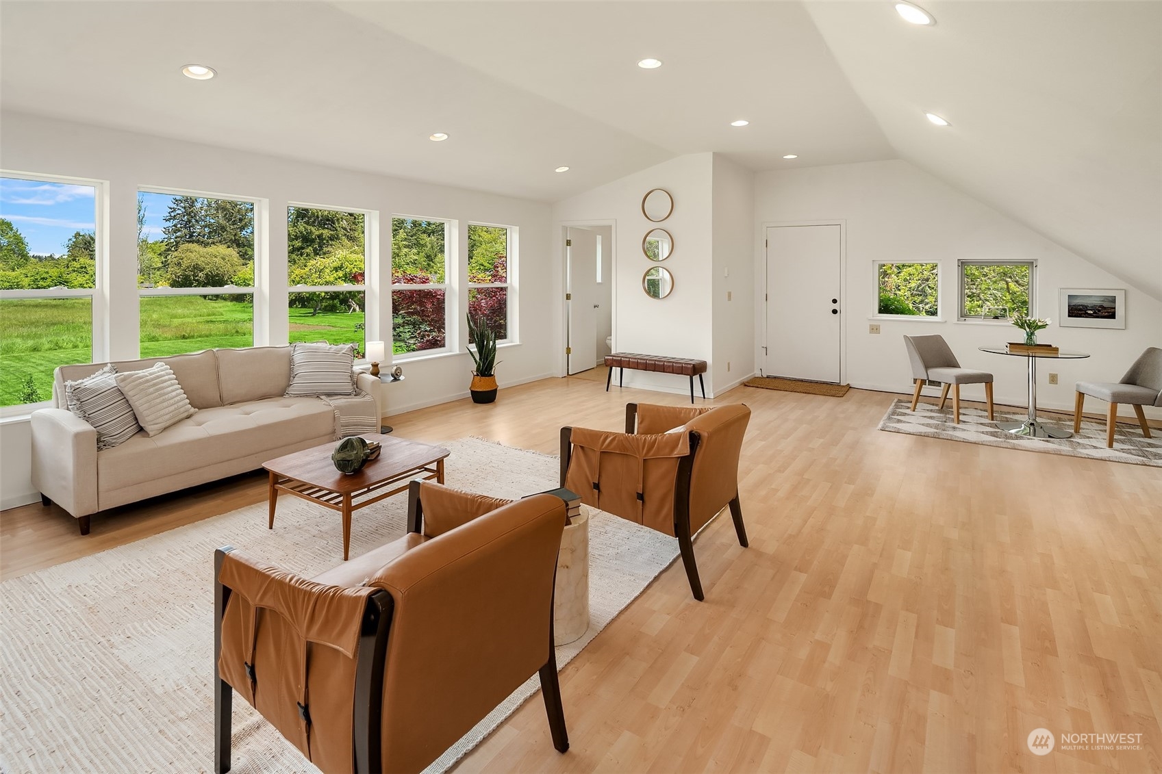 10810 Southwest Bank Road Vashon, WA 98070 - Photo 20 of 34 a living room with furniture and a large window