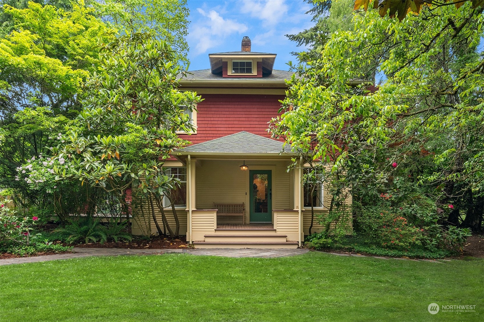 10810 Southwest Bank Road Vashon, WA 98070 - Photo 2 of 34 front view of a house with a yard